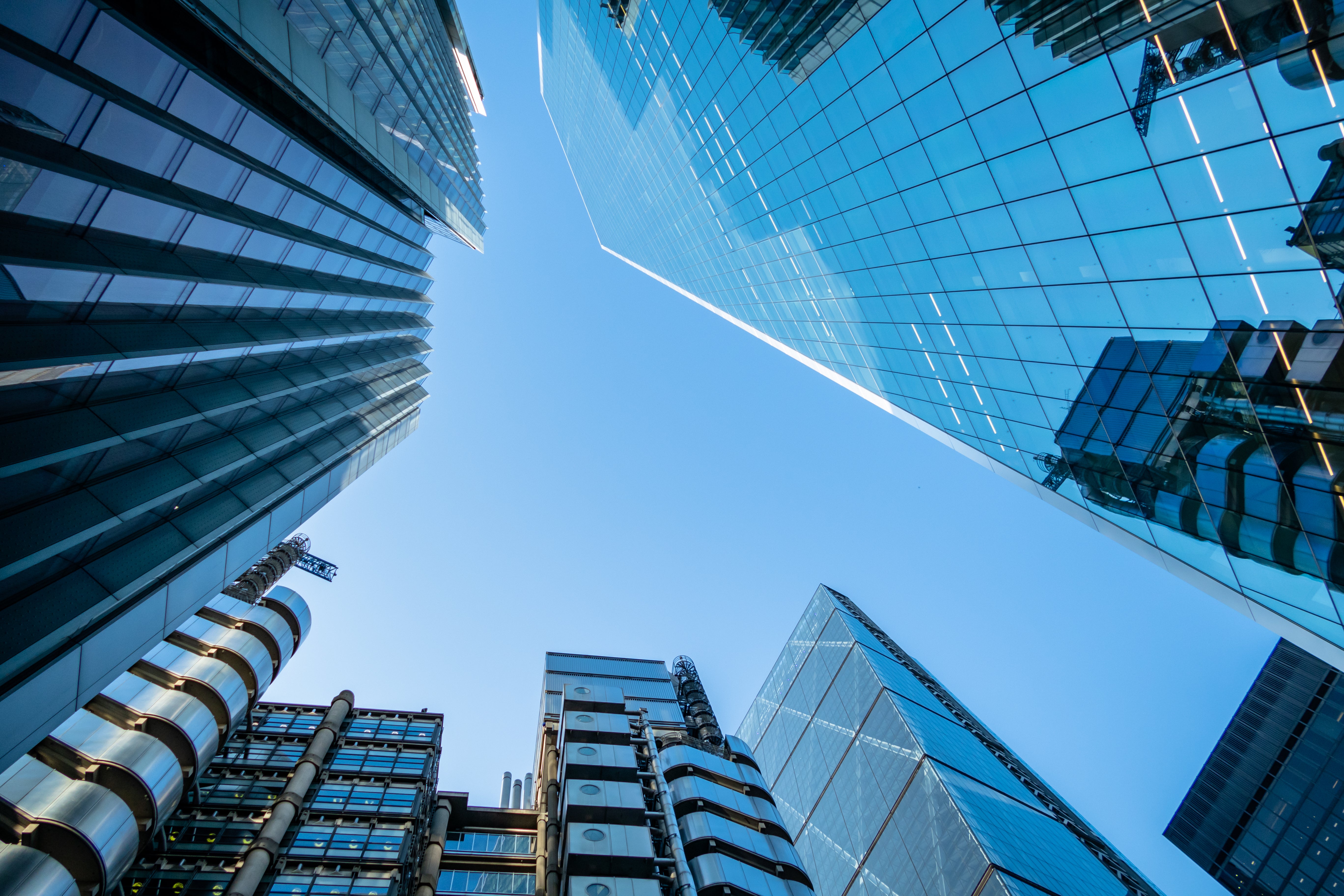 Glass office towers seen from below