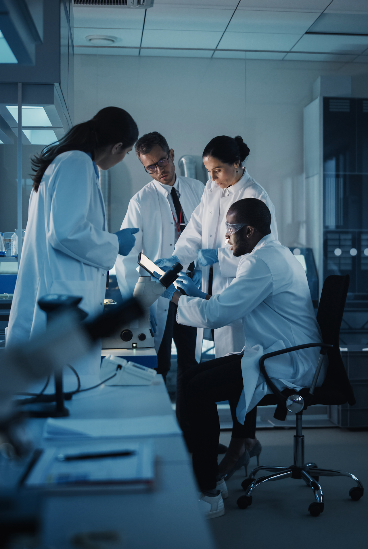 A team reviewing data in a laboratory