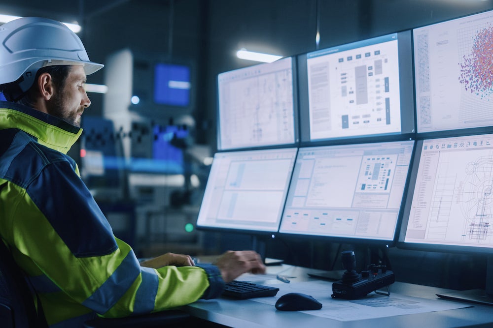 Plant floor operator viewing dashboards