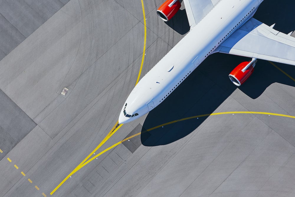 Aerial view of an airplane on a runway